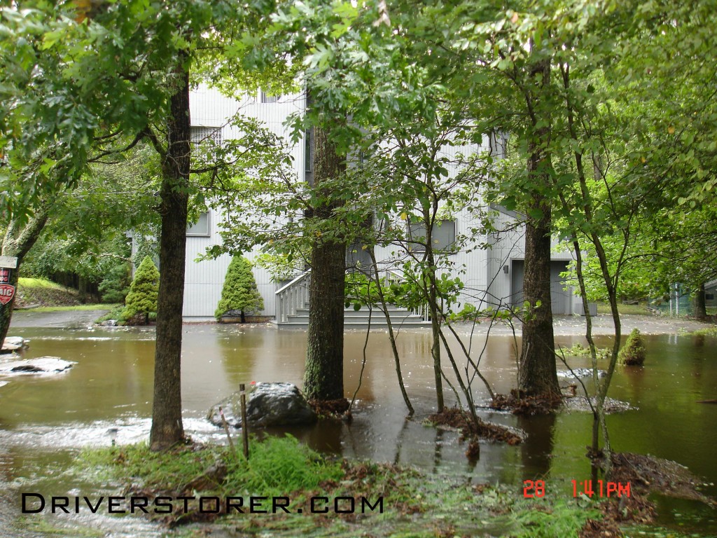 Flood waters from the Saw Creek surround a home on Decker Road